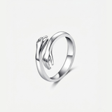 Embracing Hands Adjustable Silver Ring