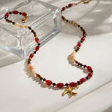 Gold Swallow and Red Stone Necklace