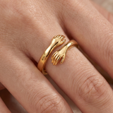 Embracing Hands Adjustable Gold Ring