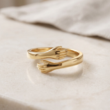 Embracing Hands Adjustable Gold Ring